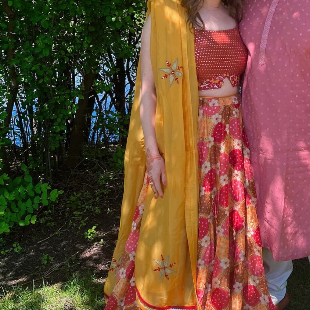 Elegant Floral Pink and Orange Embroidered Lehenga